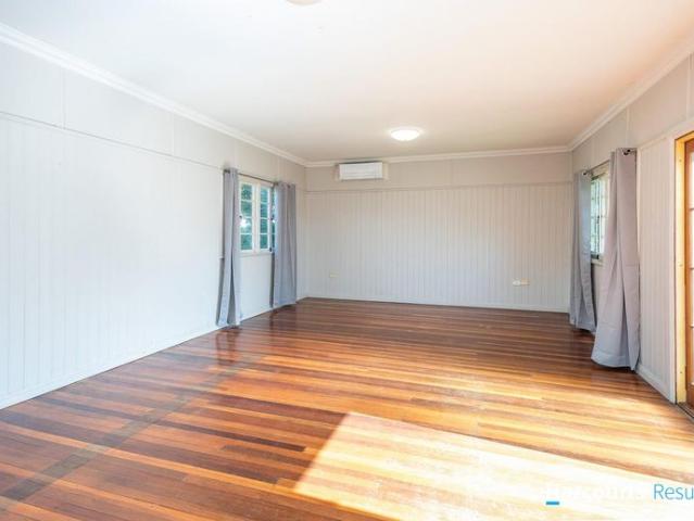Charming Post War Home with air conditioning and side access to large back yard 6 month lease only