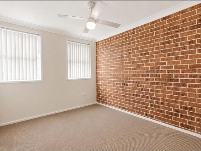 Charming, Private Townhouse in a Convenient Minto Location !