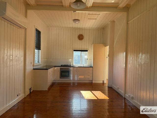 Charming Queenslander with Exceptional Shedding, Spacious Yard & Modern Comfort