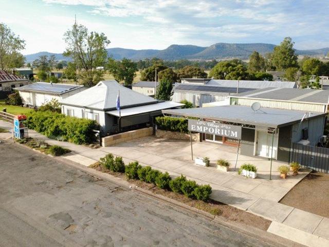 Charming Renovated Cottage with Commercial Income Potential