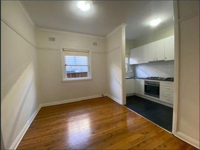 Charming Renovated Two Bedroom Unit with Private Backyard