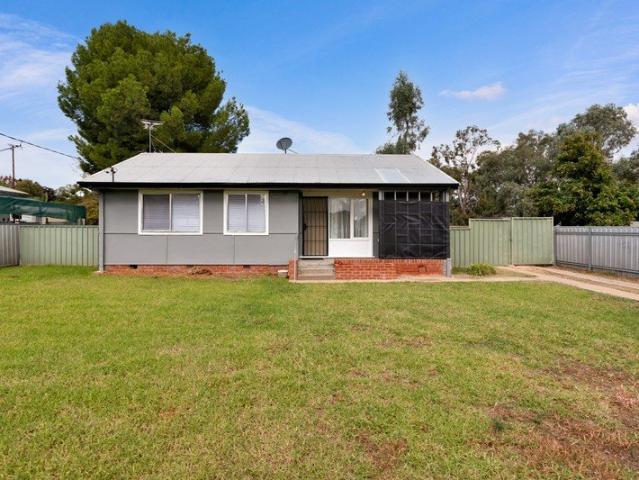 Charming Retreat on a Spacious Block