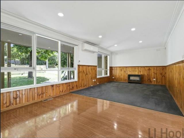 Charming single level brick family home Behind the picket fence!