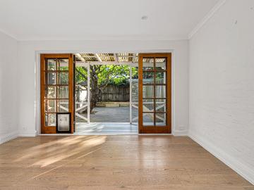 Charming Single Level Home in Vibrant Village Setting