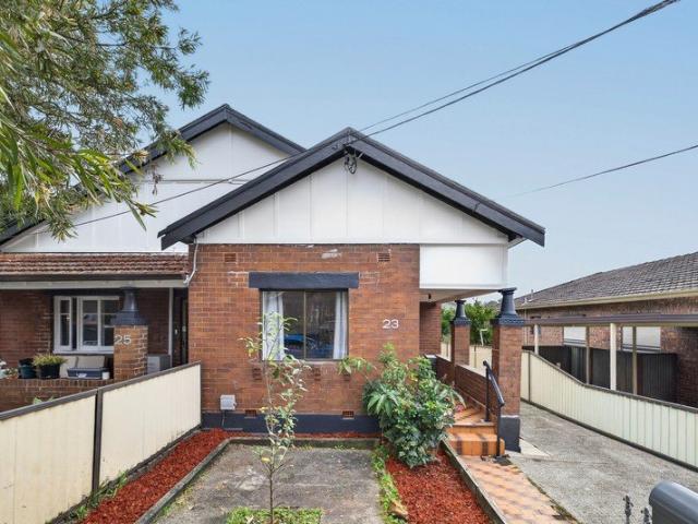 Charming Solid Brick Home with Endless Potential