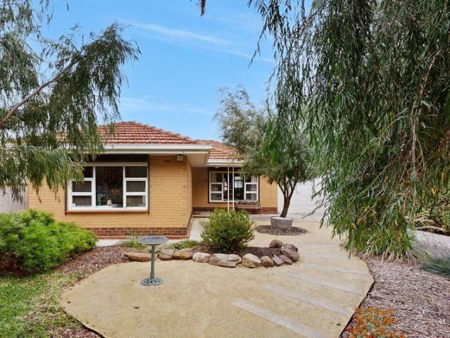 Charming solid brick home with endless potential!
