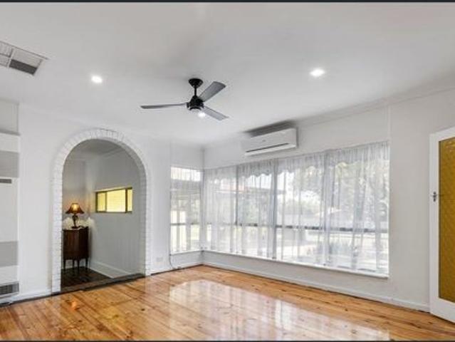 Charming Solid Brick Home with Multiple Living Areas & a Big Backyard