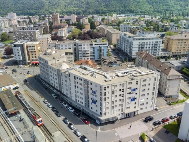 Cherchez vous un logement proche de la Gare CFF avec parking