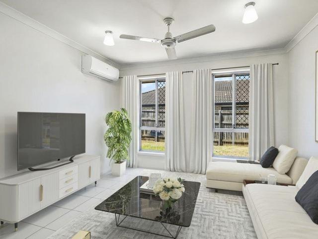 Cherished & Lovingly Maintained. 4 Bed 2 Living Family Home,Perfect size 553m2 Block Booming SE Qld !