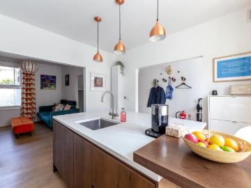 Chic mid terrace house with private garden Has a House