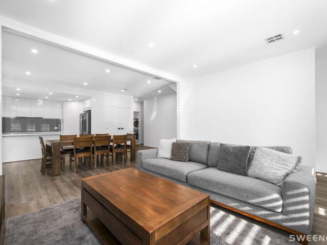Chic and Spacious home positioned within a quiet and convenient location