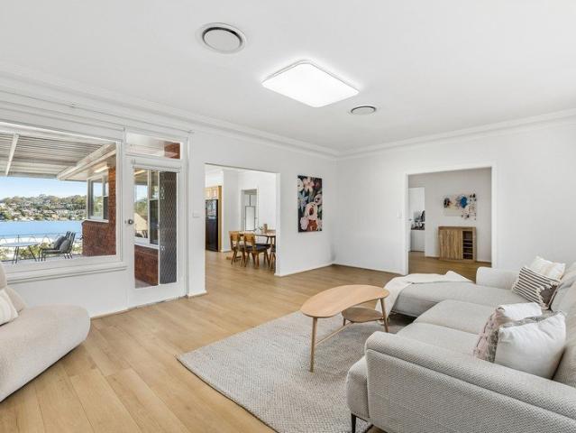 Chic Designer Double Brick Home With Lovely Water Views, Wide Frontage, North Facing Sun, Blue Ribbon Street, Multi Living & 1 Min Walk To 953 Bus!