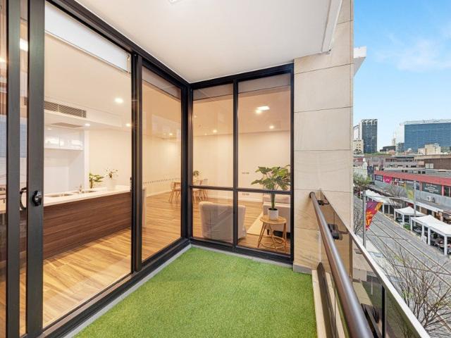 Chic light filled apartment with updated interiors and private entry
