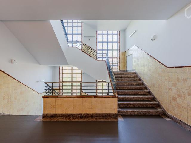 Chic Retreat: In Berlin's Heart Mitte, Uniting Historic Industrial Flair with Modern Design, Berlin Amsterdam Apartments for Rent