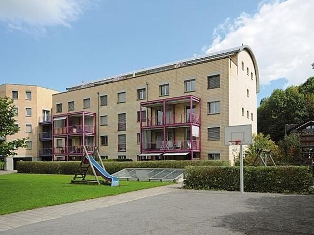 Child friendly residential area with garden seating area