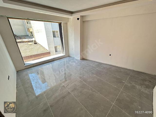CİHAN EMLAKTAN SATILIK İHSANİYEDE MERKEZE YAKIN SIFIR 2+1 DAİRE