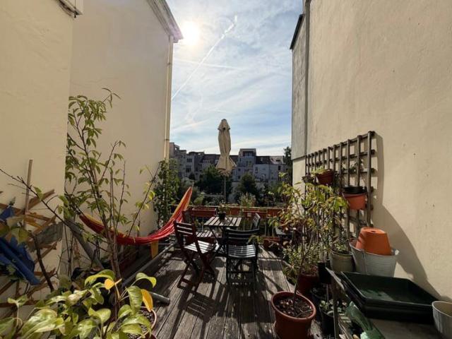 CINQUANTENAIRE APP MEUBLE 1CH ±65M² ET TERRASSE 15M²