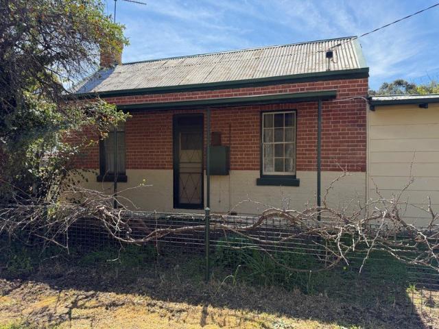 CIRC 1870's COTTAGE ON A GENEROUS BLOCK ZONED RESIDENTIAL