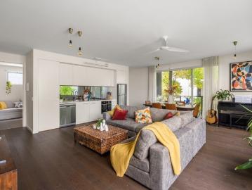 City Fringe Apartment with a Leafy Linear Park Perspective