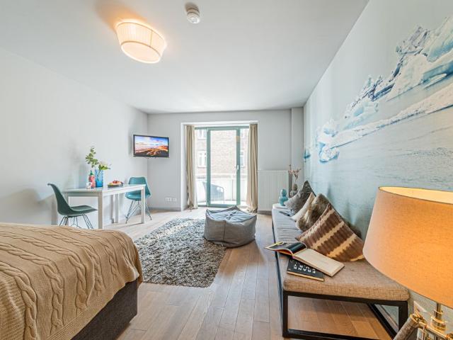 City Residence: 1 Zimmer Wohnung in einem Apartmenthaus am Merianplatz