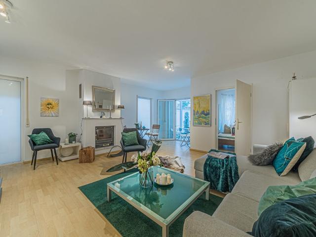 City Residence: Westend: Großzügige schöne 2 Zimmer Wohnung mit Wintergarten und Garten