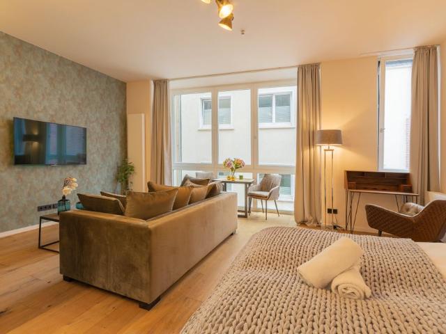 City Residence: Downtown Frankfurt: Schickes Apartment im Boutique Hotel Stil