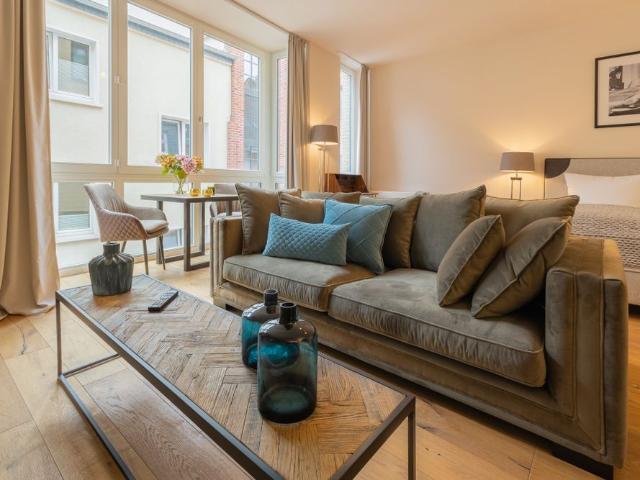 City Residence: Downtown Frankfurt: Schickes Apartment im Boutique Hotel Stil