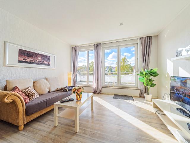 City Residence: Modern 2 room apartment with roof terrace and parking space – euhabitat