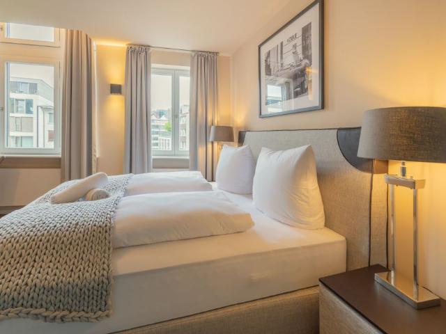 City Residence: Schickes Apartment Downtown Frankfurt im Boutique Hotel Stil