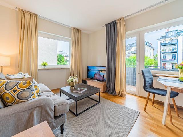 City Residence: Schickes Apartment mit Balkon in toller Lage