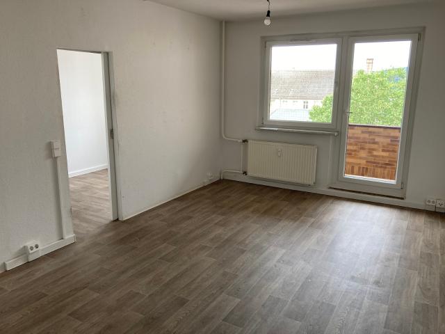 City Vibes genießen: Modernisierte Wohnung mit Balkon und Stellplatz