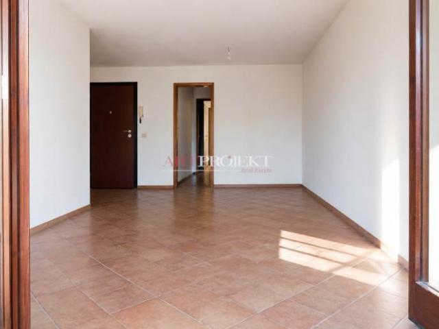 Comano – Elegante appartamento 2.5 locali con piscina e vista panoramica