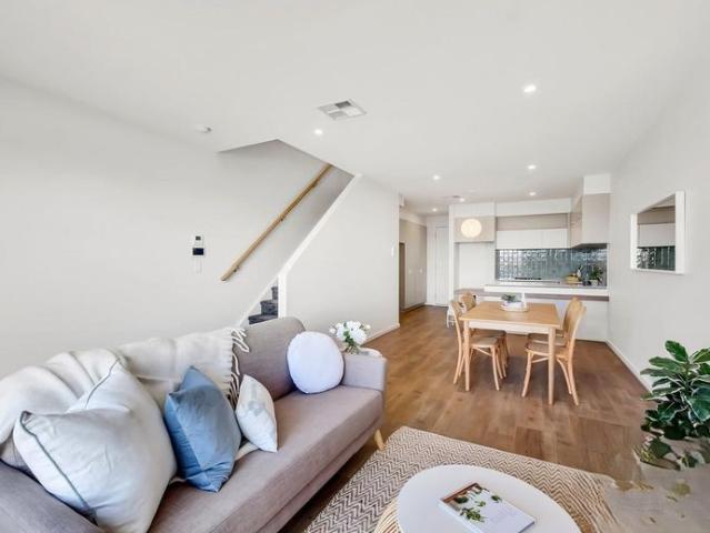 Come Home to Relaxed Waterfront Living at Dock ONE PLEASE APPLY THROUGH REALESTATE.COM