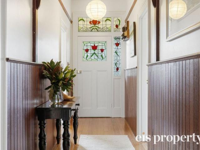 Come Home to Timeless Sandy Bay Living