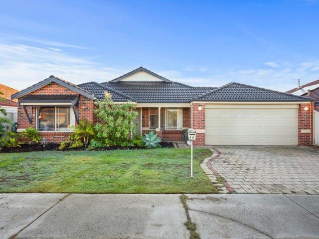 COMFORT AND CONVENIENCE COMBINED WITHIN THIS LOW MAINTENANCE FAMILY HOME