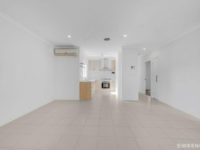 Comfortable 2 Bedroom Home with Private Backyard