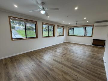 Comfortable 3 Bedroom Brick Home with Air Conditioning & Garage