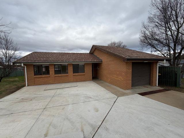 Comfortable 3 Bedroom Brick Home with Air Conditioning & Garage