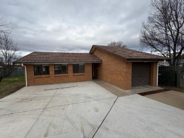 Comfortable 3 Bedroom Brick Home with Air Conditioning & Garage