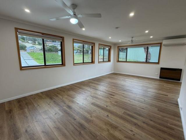 Comfortable 3 Bedroom Brick Home with Air Conditioning & Garage