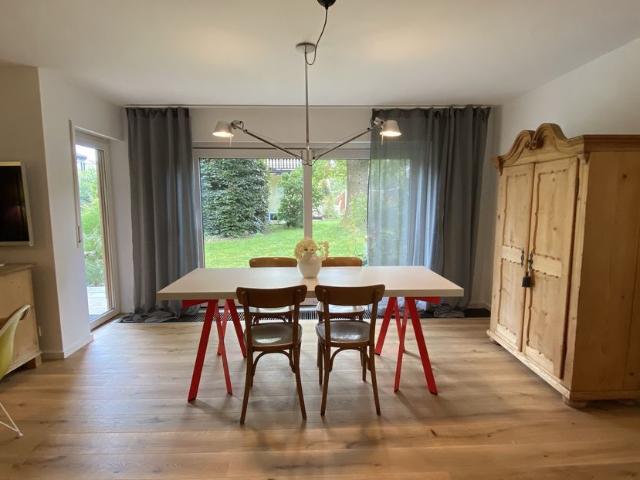 Comfortable 3 room garden apartment with stylish furniture and garage