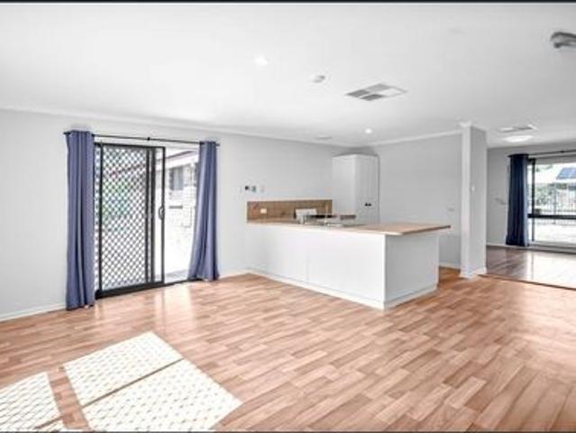 COMFORTABLE THREE BEDROOM HOME