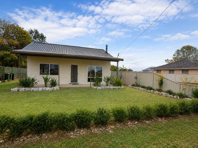 Comfortable Three Bedroom Home with Tenant in Place
