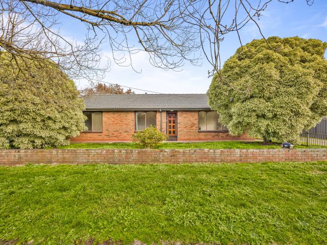 Comfortable Three Bedroom Home with Four Car Garage