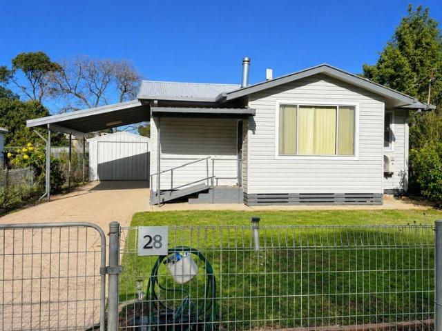 Comfortable Three Bedroom Home with Great Storage & Large Yard