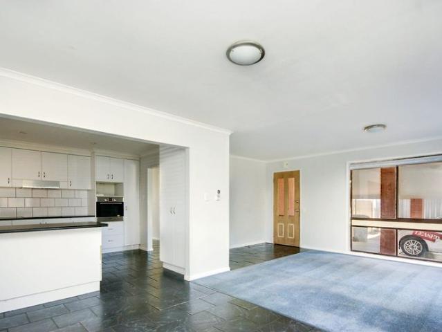 Comfortable Three Bedroom Home with Secure Yard