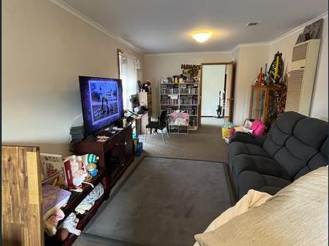 Comfortable Three Bedroom Home with Spacious Yard and Powered Shed