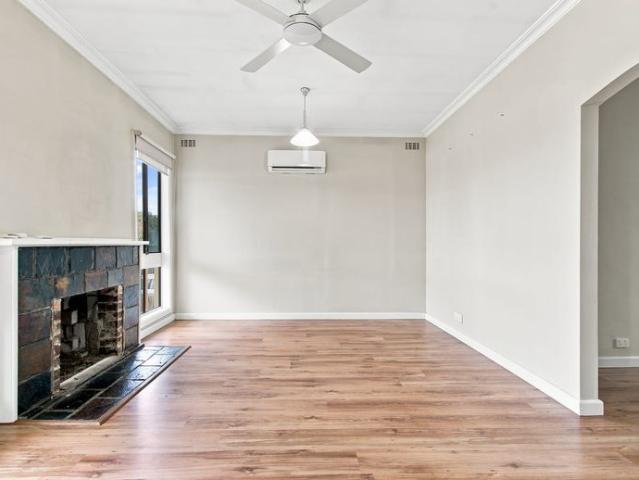 Comfortable Three Bedroom Home with Spacious Backyard
