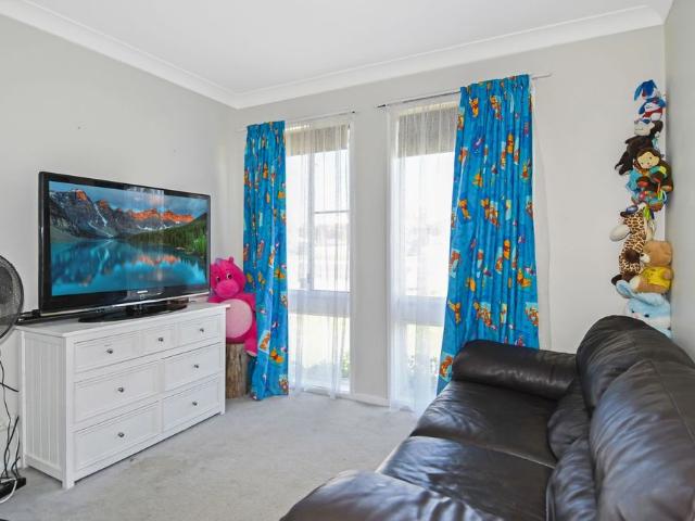 Comfortable Three Bedroom Home with Spacious Backyard