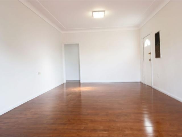 Comfortable Three Bedroom Home with Spacious Backyard